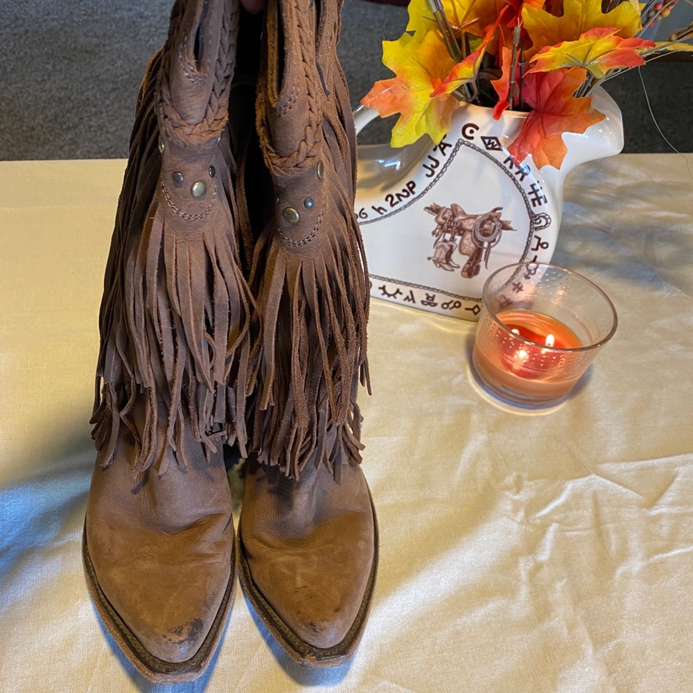 Brown fringe liberty black boots